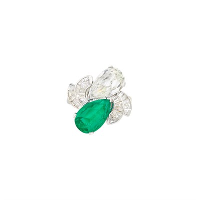 Lot 225 - Platinum, Emerald and Diamond Crossover Ring