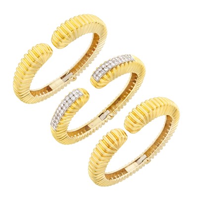 Lot 333 - Gold, Platinum and Diamond Bangle Bracelet, Wander, France, and Pair of Gold Bangle Bracelets