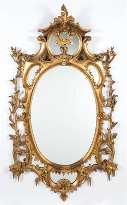Lot 1091 - George II Style Giltwood Mirror The oval...