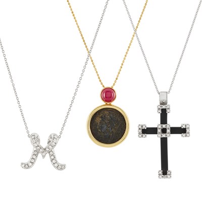 Lot 160 - Three Two-Color Gold, Platinum, Diamond, Ruby and Coin Pendants and Chains
