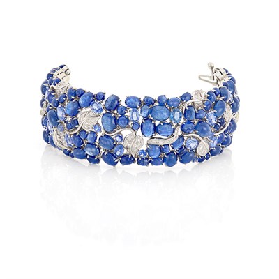 Lot 452 - Wide White Gold, Cabochon Sapphire, Sapphire and Diamond Bracelet, Seaman Schepps