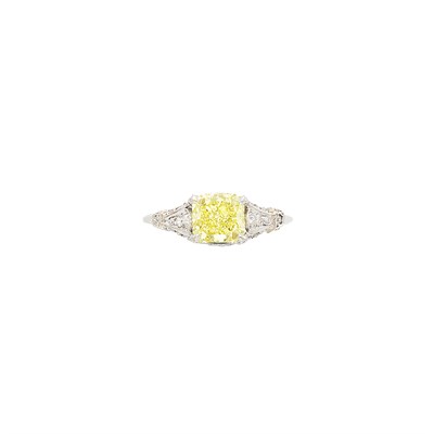 Lot 497 - Platinum, Fancy Yellow Diamond and Diamond Ring