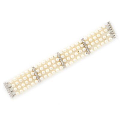Lot 1478 - Four Strand White Gold, Cultured Pearl and Diamond Bracelet