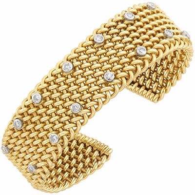 Lot 220 - Gold and Diamond Bangle Bracelet