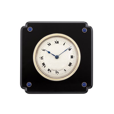 Lot 150 - Black Onyx and Cabochon Sapphire Desk Clock, Cartier, Paris