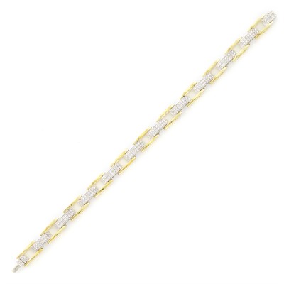 Lot 1209 - Two-Color Gold and Diamond Link Bracelet