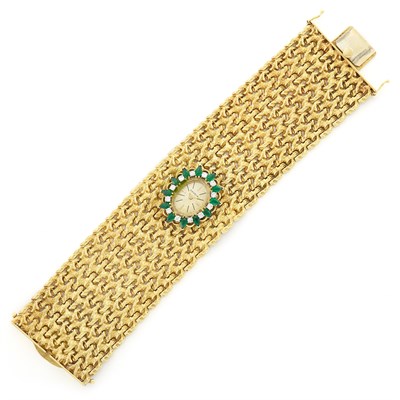 Lot 1103 - Wide Gold, Simulated Emerald and Diamond Bracelet-Watch