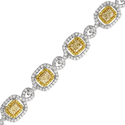 Lot 123 - Two-Color Gold, Diamond and Yellow Diamond Bracelet