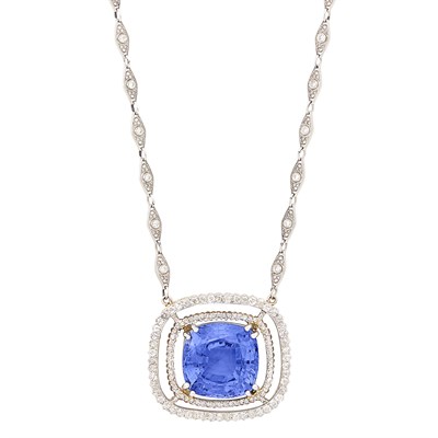 Lot 487 - Platinum, Gold, Sapphire and Diamond Pendant with Platinum and Diamond Chain