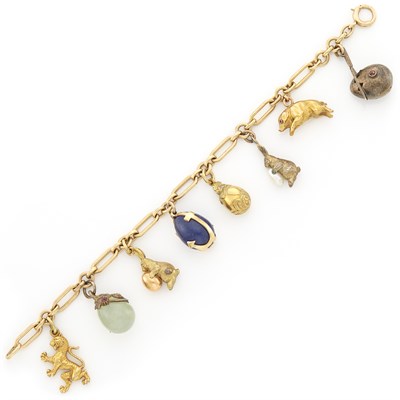 Lot 1591 - Gold, Metal and Hardstone Charm Bracelet, Tiffany & Co.