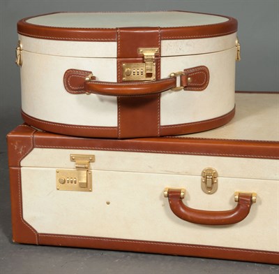 Lot 213 - Pair of T. Anthony Vellum and Leather...