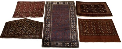 Lot 568 - Group of Five Turkoman Rugs A Baluch rug, a...