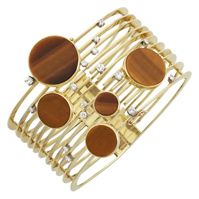 Lot 414 - Two-Color Gold, Tigers Eye and Diamond Bangle Bracelet