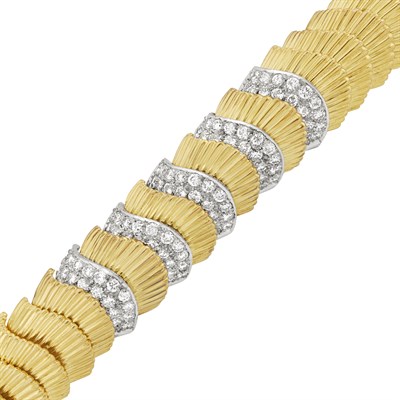 Lot 411 - Two-Color Gold and Diamond Bracelet