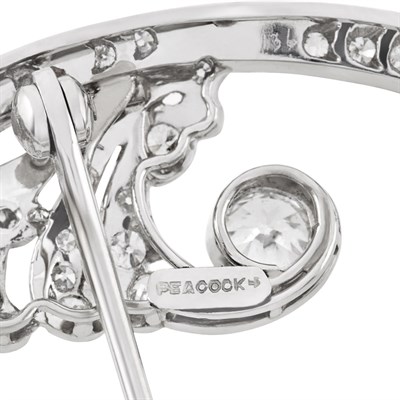Lot 489 - Edwardian Platinum, Diamond and Emerald Circle Brooch, Peacock