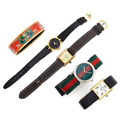 Lot 1583 - Two Gold-Plated 'Tank' Wristwatches, Must de Cartier, Two Metal Wristwatches, Gucci, and Enamel Bangle Bracelet, Hermès