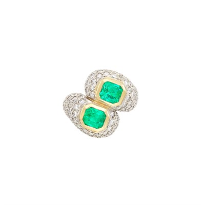 Lot 329 - Platinum, Gold, Emerald and Diamond Crossover Ring