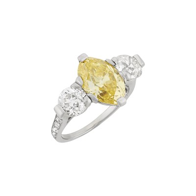Lot 495 - Platinum, Fancy Vivid Yellow Diamond and Diamond Ring, Cartier