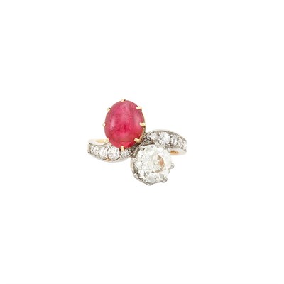 Lot 140 - Antique Gold, Platinum, Diamond and Cabochon Ruby Crossover Ring