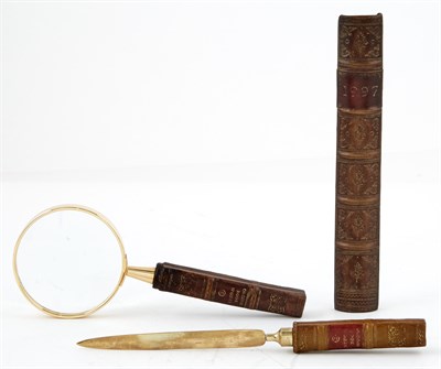 Lot 1009 - Two Original Book Works Leather Clad Handled...