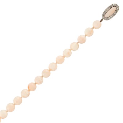 Lot 572 - Long Angel Skin Coral Bead, Two-Color Gold and Diamond Necklace, Bracelet, Pair of Earrings and Ring