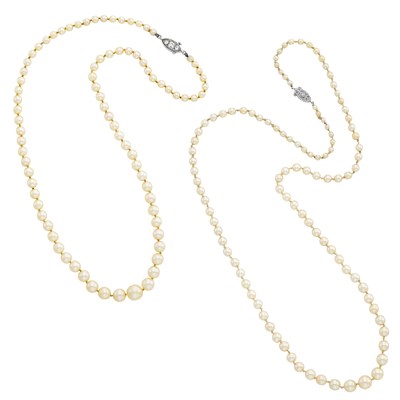 Lot 1183 - Two Pearl Necklaces with Platinum and Diamond Clasps