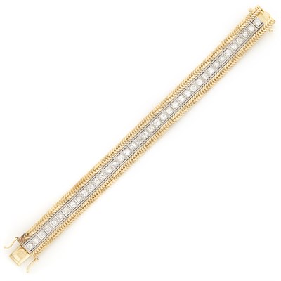 Lot 1433 - Two-Color Gold, Platinum and Diamond Bracelet