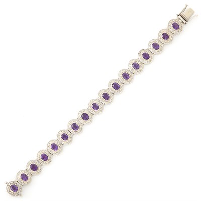 Lot 1414 - White Gold, Amethyst and Diamond Bracelet