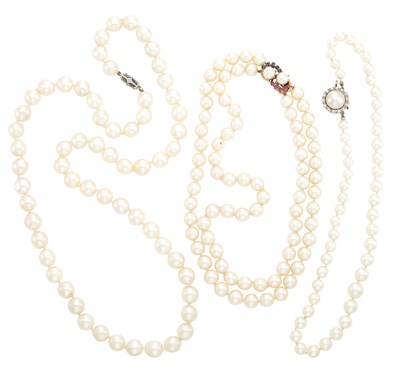 Lot 1696 - Three Cultured Pearl Necklaces with Platinum, Gold, Mabé and Cultured Pearl, Diamond and Gem-Set Clasps