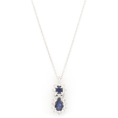 Lot 1533 - White Gold, Sapphire and Diamond Pendant-Necklace