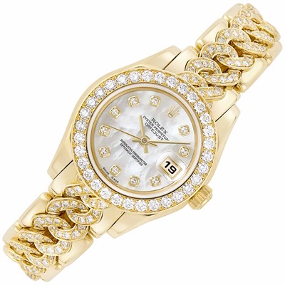 Lot 395 - Gold, Mother-of-Pearl and Diamond 'Oyster Perpetual Datejust Pearlmaster' Wristwatch, Rolex, Ref. 2078