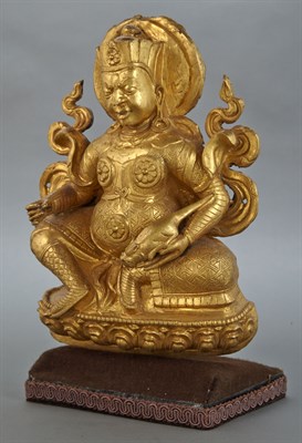 Lot 87 - Tibetan Gilt-Bronze Figure of Vaishravana Qing...