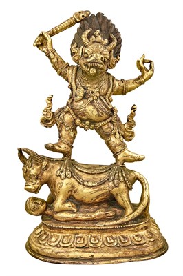 Lot 100 - Tibetan Gilt-Bronze Figure of Yama on a Bull...