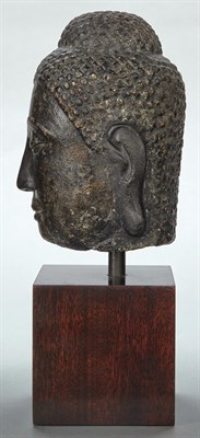 Lot 84 - Thai Bronze Head of Buddha The slender face...