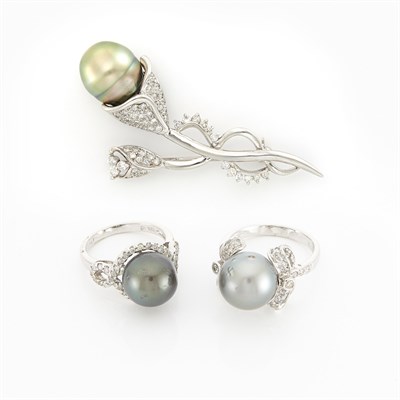 Lot 1165 - White Gold, Tahitian Cultured Pearl and Diamond Brooch and Two Rings