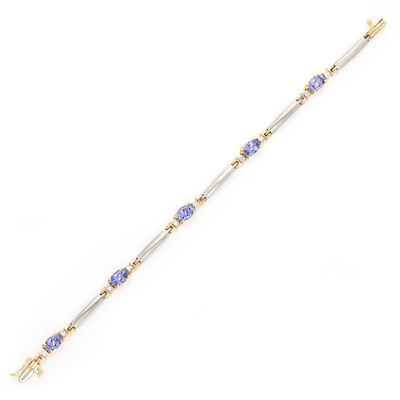 Lot 1206 - Two-Color Gold, Tanzanite and Diamond Bracelet