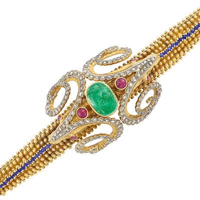 Lot 303 - Two-Color Gold, Cabochon Emerald and Ruby, Diamond and Sapphire Ram's Head Bracelet