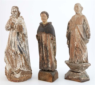 Lot 475 - Three Carved and Painted Wood Santos Figures...