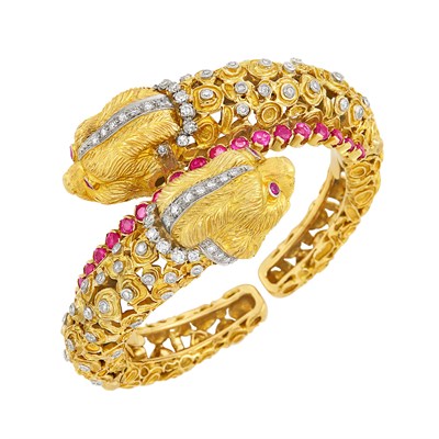 Lot 302 - Two-Color Gold, Ruby and Diamond Chimera Head Bangle Bracelet, Zolotas