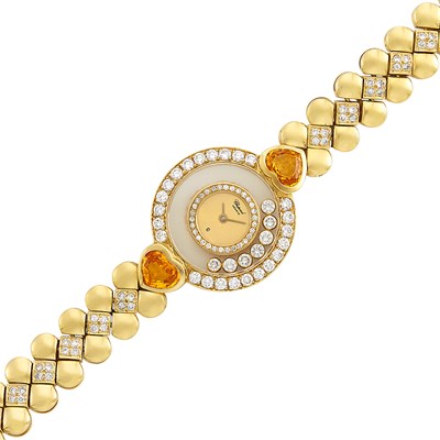 Lot 237 - Gold, Crystal, Diamond and Citrine 'Happy Diamonds' Wristwatch, Chopard