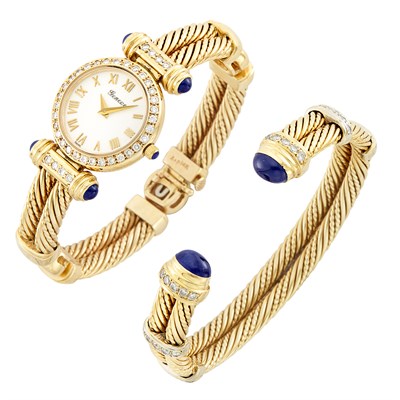 Lot 247 - Gold, Diamond and Cabochon Sapphire Bangle-Watch and Bangle Bracelet