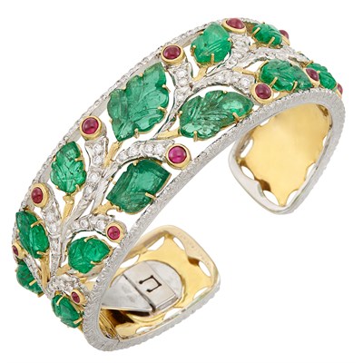Lot 528 - Two-Color Gold, Carved Emerald, Cabochon Ruby and Diamond Bangle Bracelet