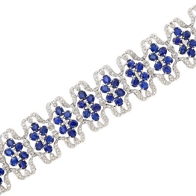 Lot 414 - Wide White Gold, Sapphire and Diamond Bracelet