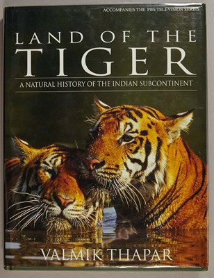Lot 299 - THAPAR, VALMIK Land of the Tiger. A Natural...