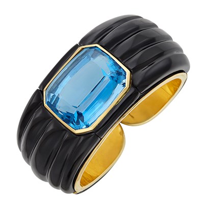 Lot 575 - Gold, Carved Black Onyx and Blue Topaz Cuff Bangle Bracelet