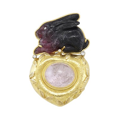 Lot 579 - Hammered Gold, Carved Bi-Colored Tourmaline Rabbit, Rose Quartz and Diamond Pendant-Brooch