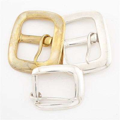 Lot 1755 - Two Sterling Silver Belt Buckles and Brass Belt Buckle, Linda Lee Johnson