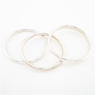 Lot 1750 - Three Sterling Silver Bangle Bracelets