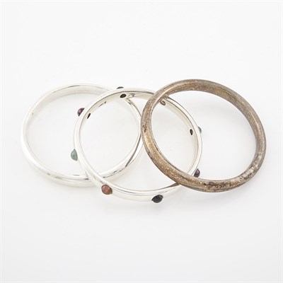 Lot 1754 - Two Silver Bangle Bracelets and Gem-Set Bangle Bracelet