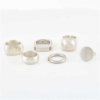 Lot 1808 - Four Silver Rings and Platinum and Gold Band Ring, Linda Lee Johnson
